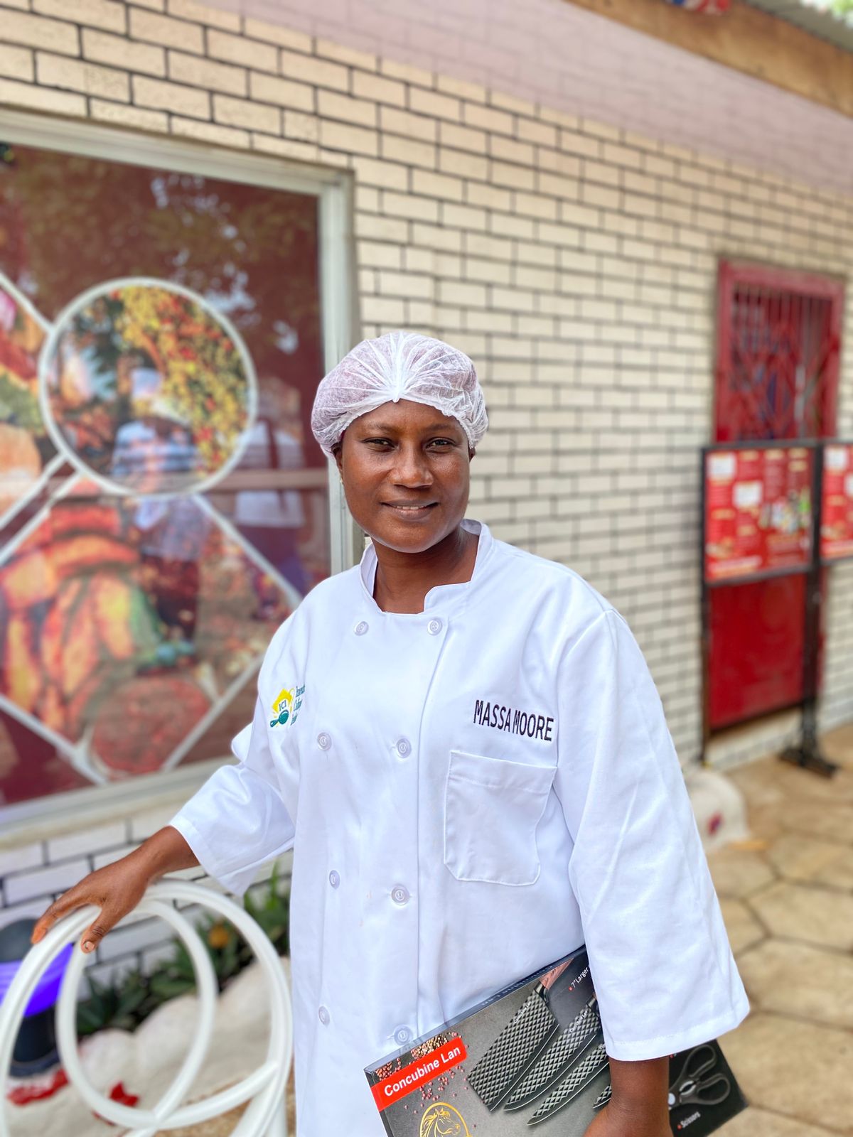 Chef Massa Moore with her knife set at the institute